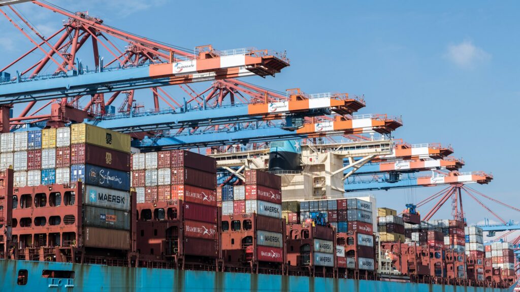 Container ship at a port in Hamburg — illustrative industry photograph
