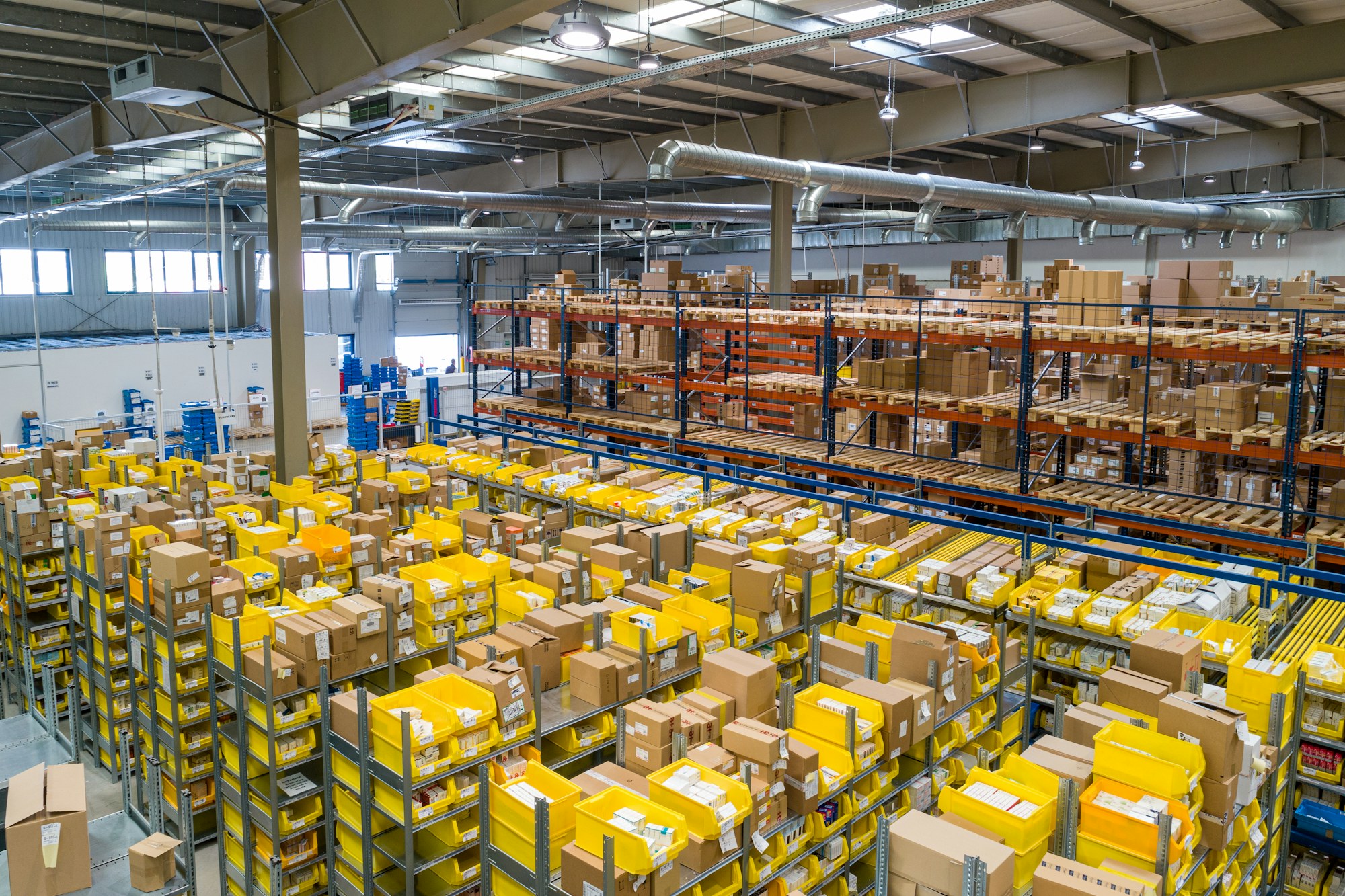 Warehouse order sorting and staging area — illustrative industry photograph